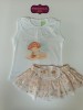 Conjunto camiseta braga falda oso en la playa de Pio pio