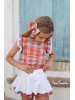 Conjunto Burdeos Noma Fernández blusa y short efecto falda
