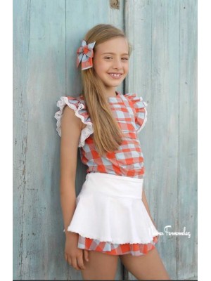 Conjunto Burdeos Noma Fernández blusa y short efecto falda
