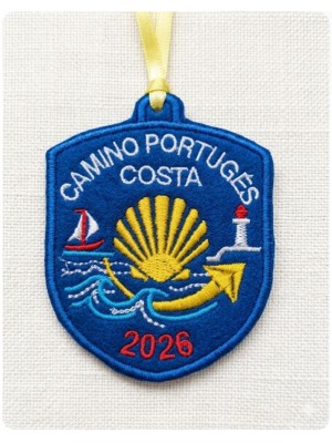 Embroidered patch of the Portuguese Way of St. James, coast, boat and lighthouse