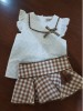 Conjunto Tilo Noma Fernández short efecto falda y blusa bordada