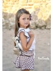 Conjunto Tilo Noma Fernández short efecto falda y blusa bordada