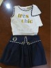 Conjunto Olmo falda camiseta blanca Noma Fernández