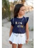 Conjunto Olmo short falda y camiseta Noma Fernández