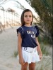 Conjunto Olmo short falda y camiseta Noma Fernández